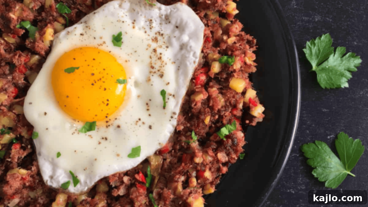 Savory corned beef hash topped with a perfectly fried egg