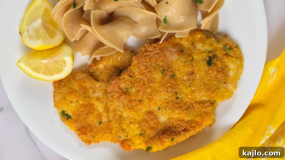 Air Fryer Wins 10 Recipes To Make You Forget Your Oven 11 Crispy Air Fryer Chicken Schnitzel with lemon wedges.