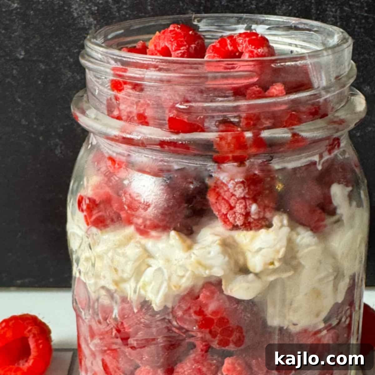 Overnight Oats: Your Favorite Frozen Fruit Creation 6 A sealed mason jar of overnight oats with frozen fruit chilling in the refrigerator.