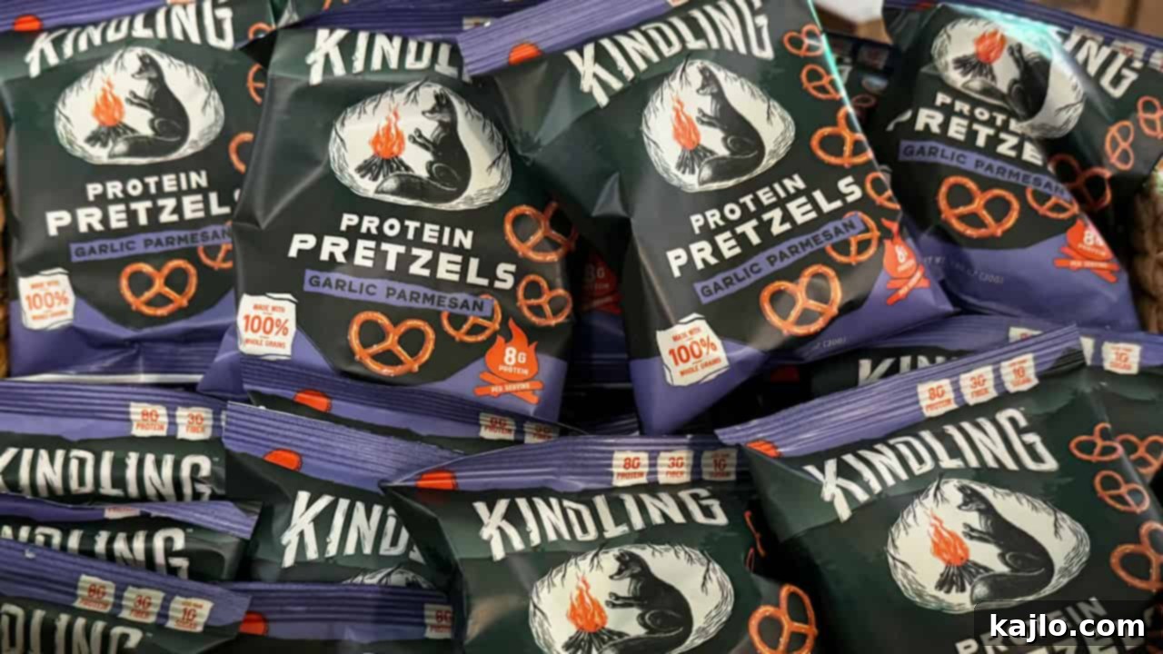 Crunchy Kindling Protein Pretzels in Dill Pickle, Honey Mustard, and Garlic Parmesan flavors.