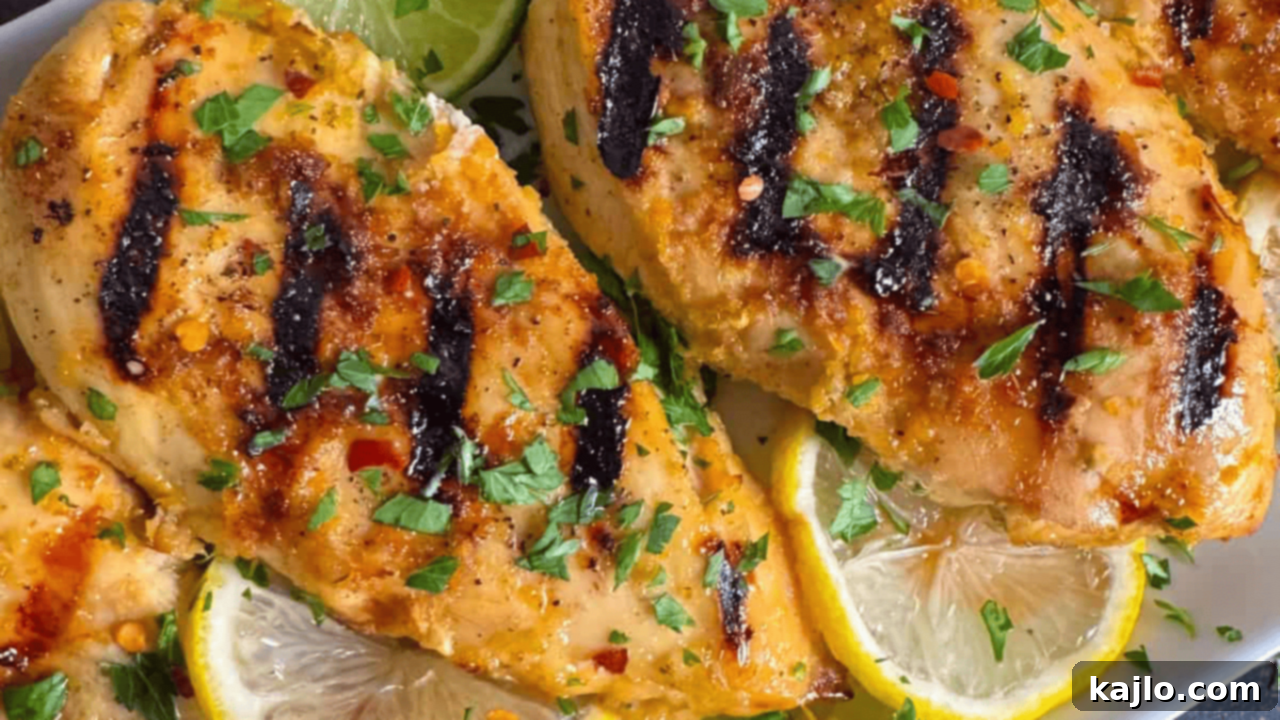 10 Legendary Meat Recipes That Always Impress 2 Tender, juicy marinated chicken breasts cooked to golden perfection in an air fryer, served with fresh herbs.
