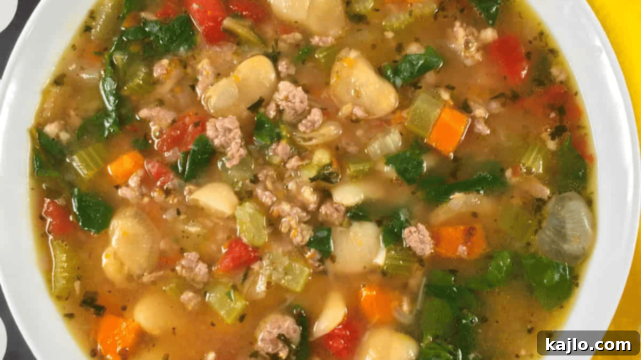 Hearty Instant Pot Italian Sausage Soup with beans, vegetables, and tomato broth