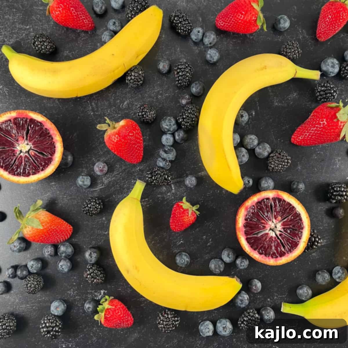 The World of B Fruits Over 40 Varieties Revealed 2 A colorful assortment of fruits beginning with the letter B, including blueberries, blackberries, and bananas.