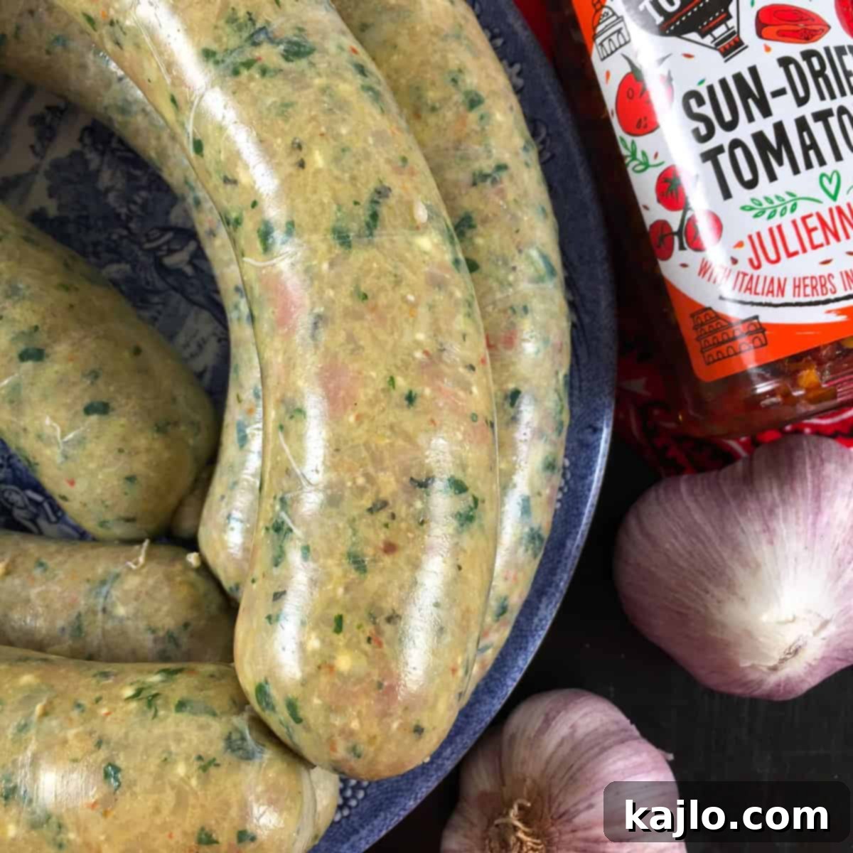 Homemade chicken feta sausage links presented on a cutting board, ready for cooking