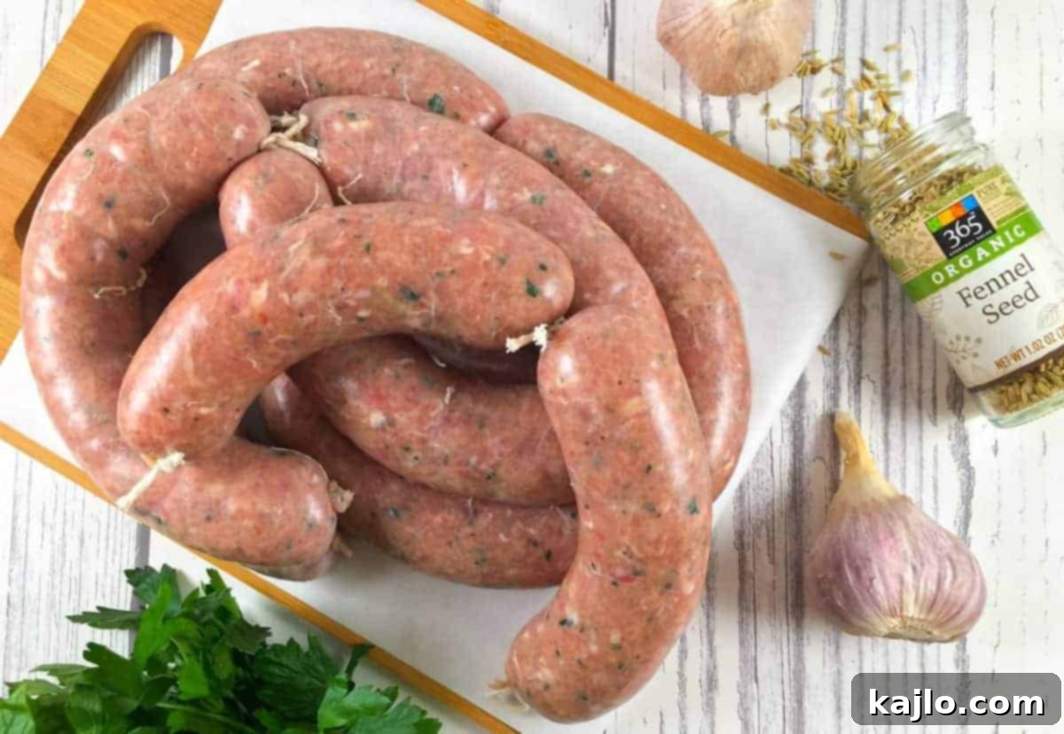 Homemade Italian fennel sausage prepared with a meat grinder, showcasing the fresh, seasoned meat mixture.