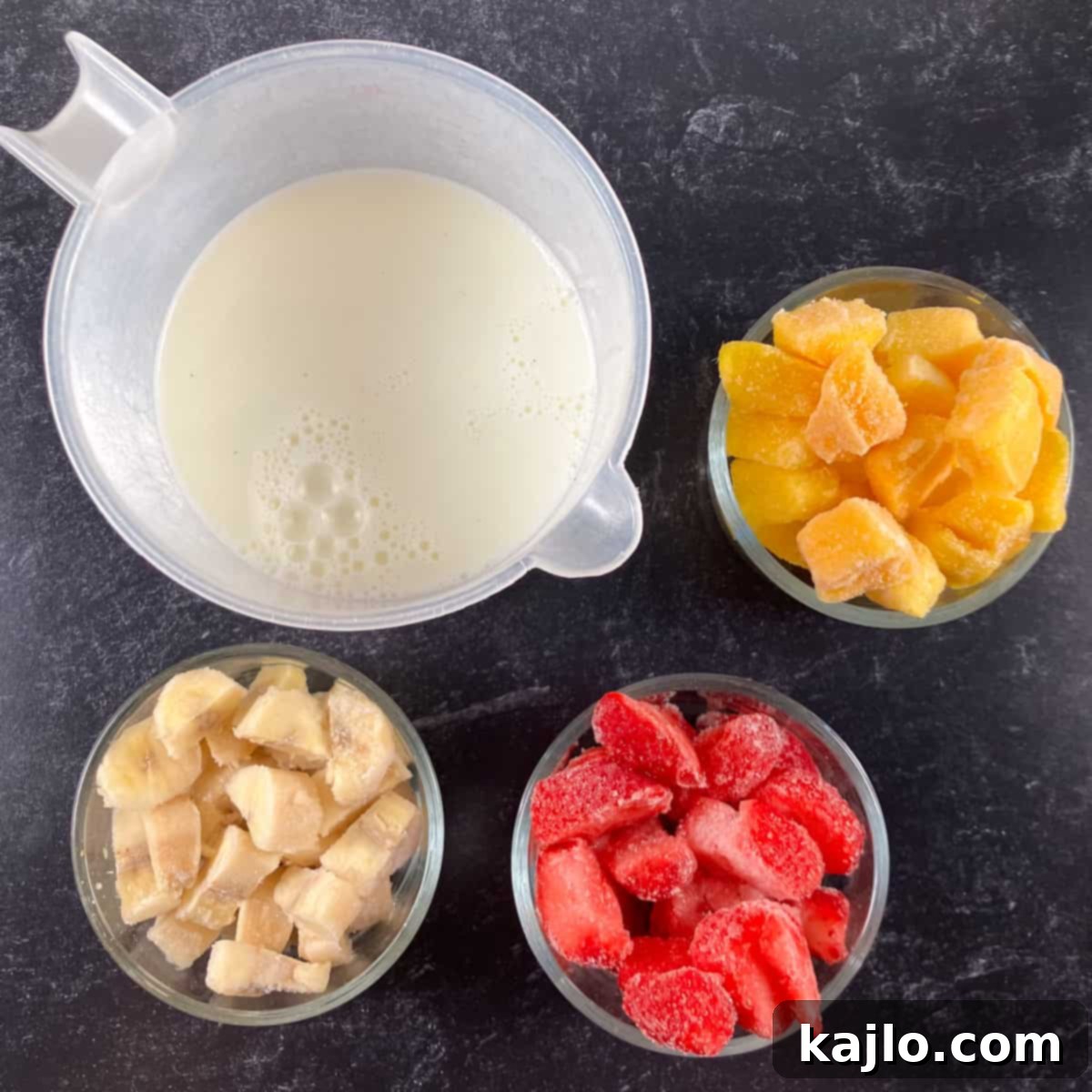 Ingredients for banana mango strawberry smoothie