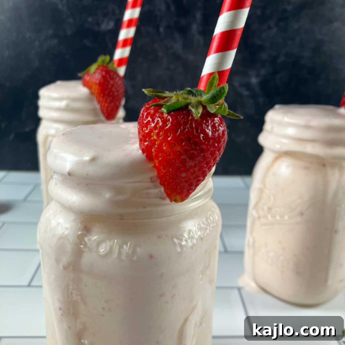 Strawberry mango banana smoothie ready to serve