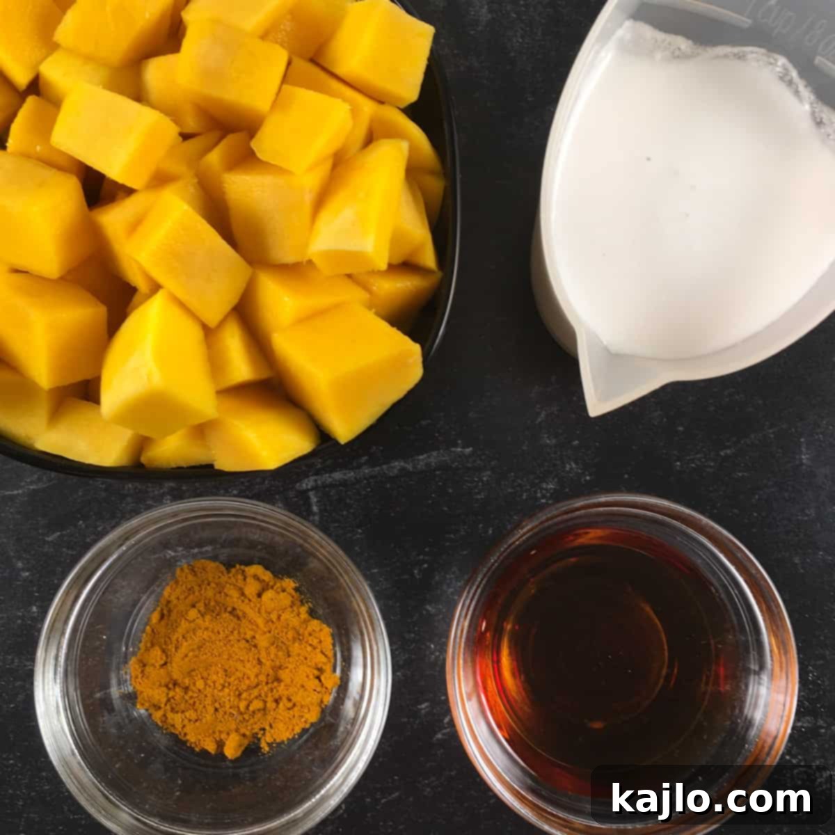 Weight Gainer Mango Popsicles 4 Ingredients for high calorie popsicles, including mango, coconut milk, and maple syrup