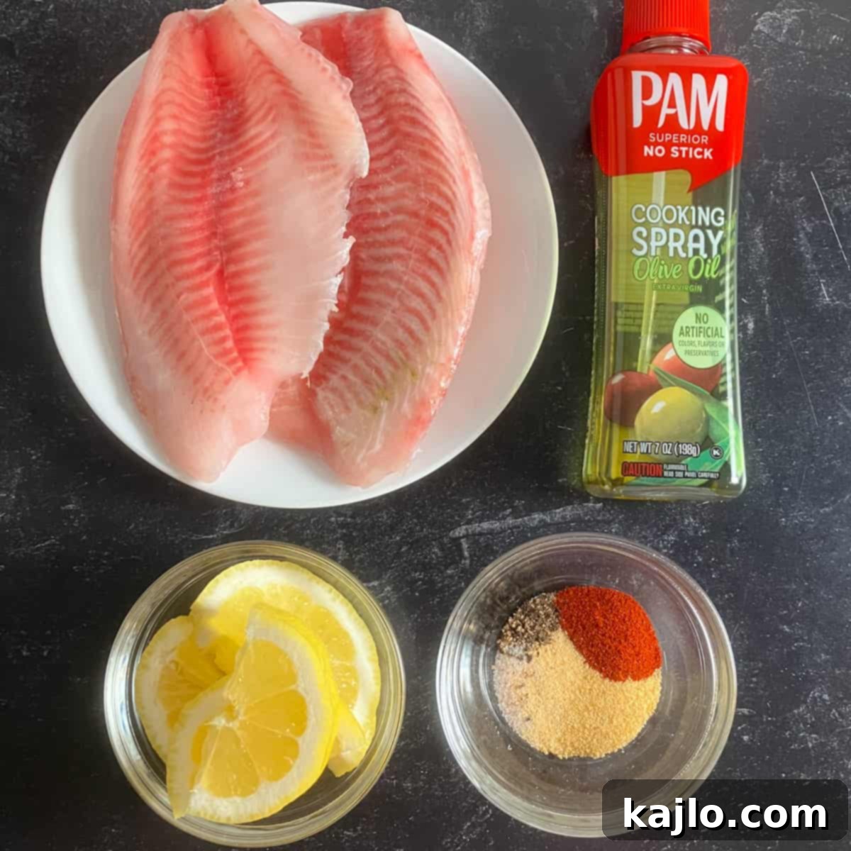 Easy Air Fryer Frozen Tilapia 3 Ingredients for air frying frozen tilapia including frozen fillets, spices, and lemon.