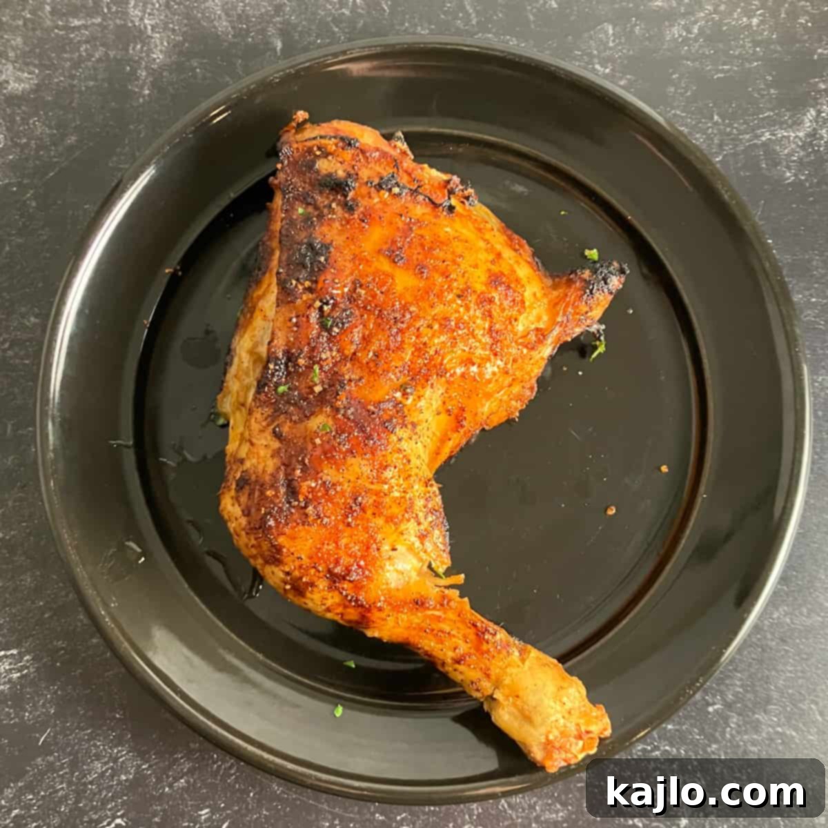 Finished air fryer chicken leg quarters, golden and ready to serve