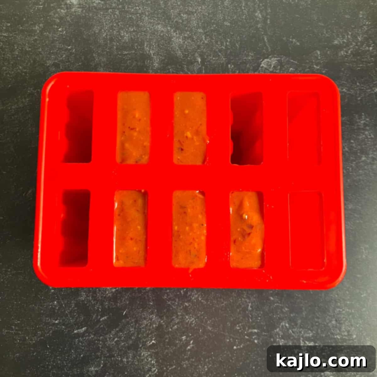 Summer Cherry Mango Pops 6 Cherry mango popsicle recipe ready to be de-molded