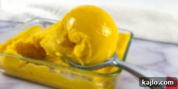 Creamy Sugar Free Mango Nice Cream 6 Scooped dairy-free mango ice cream