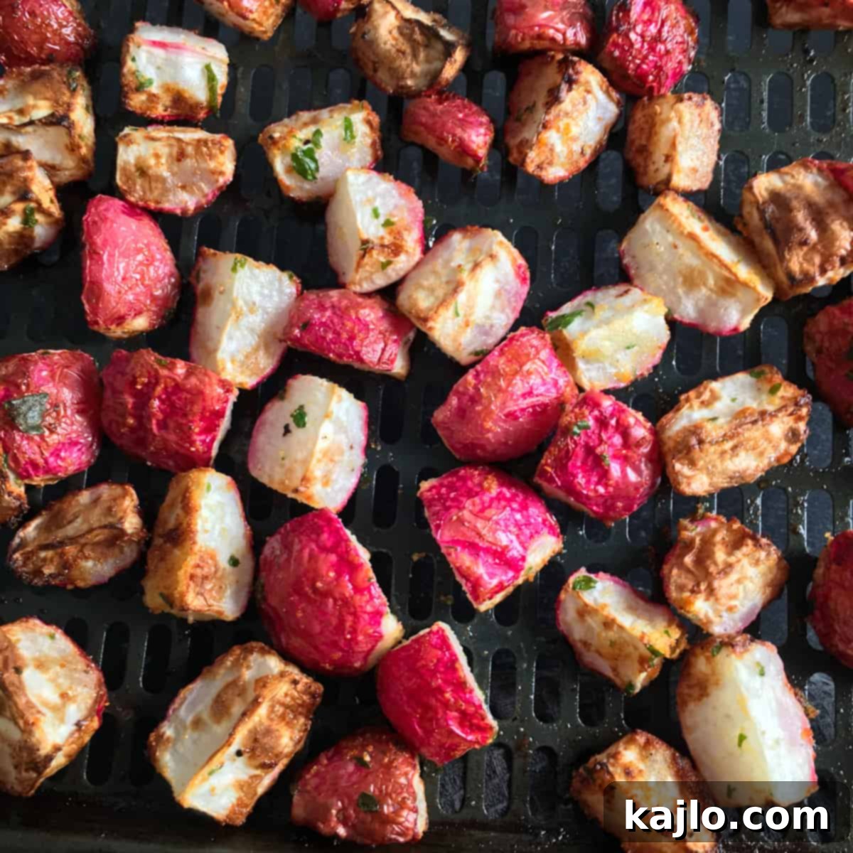 Delicious air fryer radishes topped with cheese and bacon, a perfect keto side.