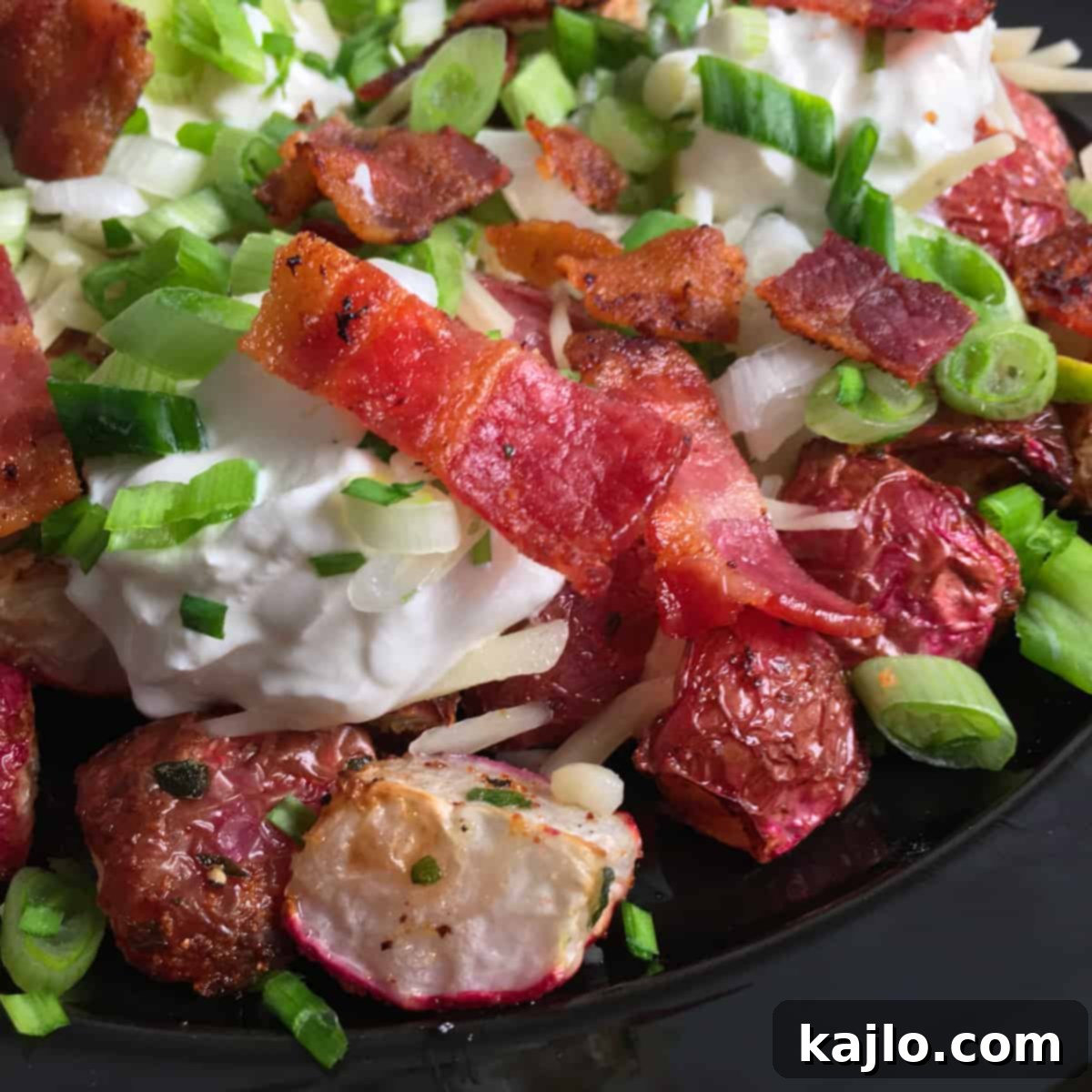 A close-up of loaded keto radishes, showcasing the rich toppings and tender vegetables.